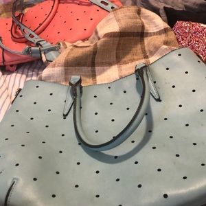 A nice light blue purse with the pouch comes out
